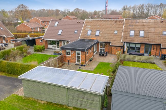 Klokkens Kvarter 113,  Holluf Pile Rækkehus